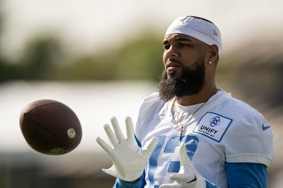 Chargers wide receiver Keenan Allen catches a pass during training camp in 2023.
