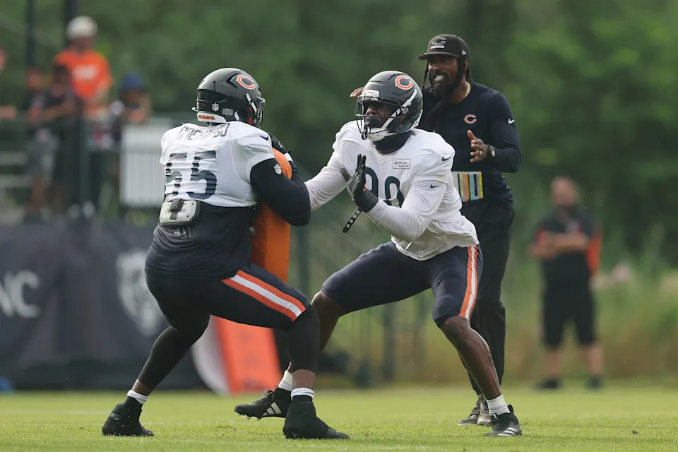 LAKE FOREST, ILLINOIS - JULY 28: Dominique Robinson #90 of the the Chicago Bears takes part in a drill with Dayo Odeyingbo #55 during Chicago Bears Training Camp at Halas Hall on July 28, 2025 in Lake Forest, Illinois. (Photo by Michael Reaves/Getty Images)