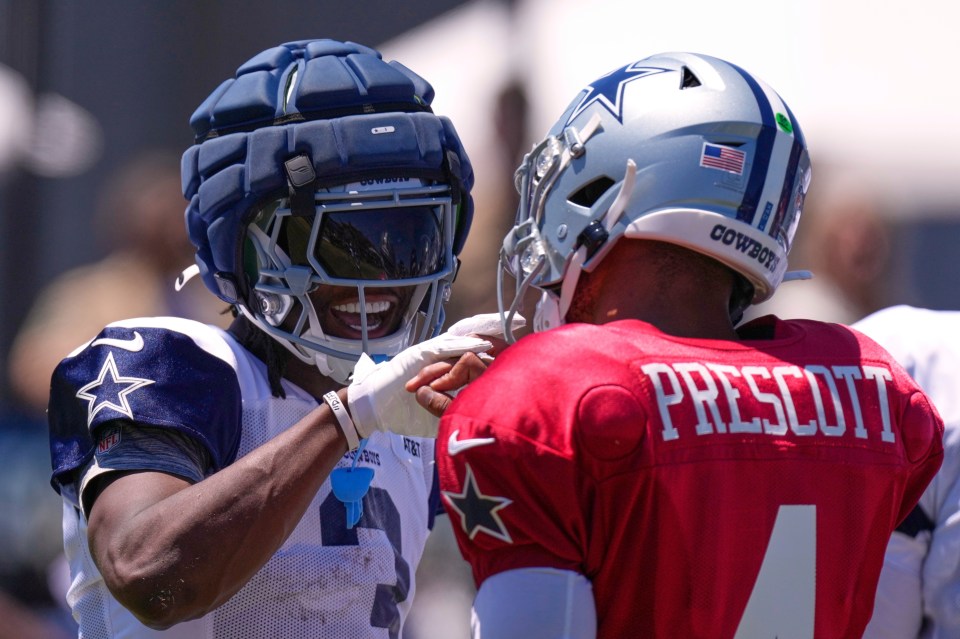 George Pickens and Dak Prescott celebrating a touchdown.