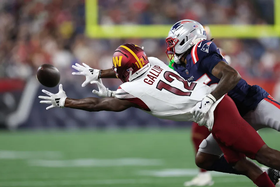 Aug 8, 2025; Foxborough, Massachusetts, USA; New England Patriots cornerback Miles Battle (35) breaks up a pass to Washington Commanders receiver Michael Gallup (12) during the first half at Gillette Stadium. Mandatory Credit: Paul Rutherford-Imagn Images© Paul Rutherford-Imagn Images