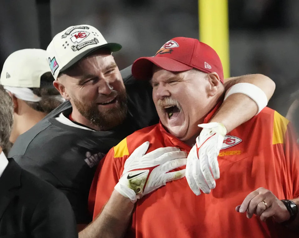 Chiefs coach Andy Reid celebrates on the podium with tight end Travis Kelce, left, after Kansas City defeated the Eagles in Super Bowl 57.&lpar;Michael Chow &sol; USA TODAY NETWORK via Imagn Images
