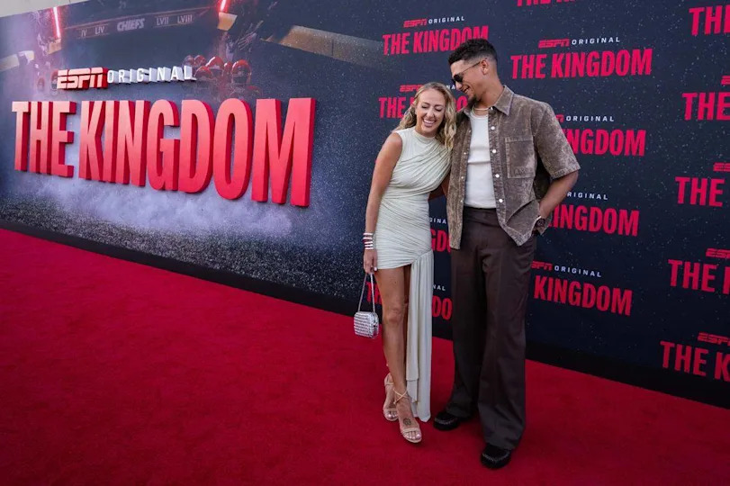 Patrick and Brittany Mahomes share a laugh on the red carpet before the special screening of the ESPN six-part series ‘The Kingdom,’ on Sunday, Aug. 24, 2025, in Kansas City.