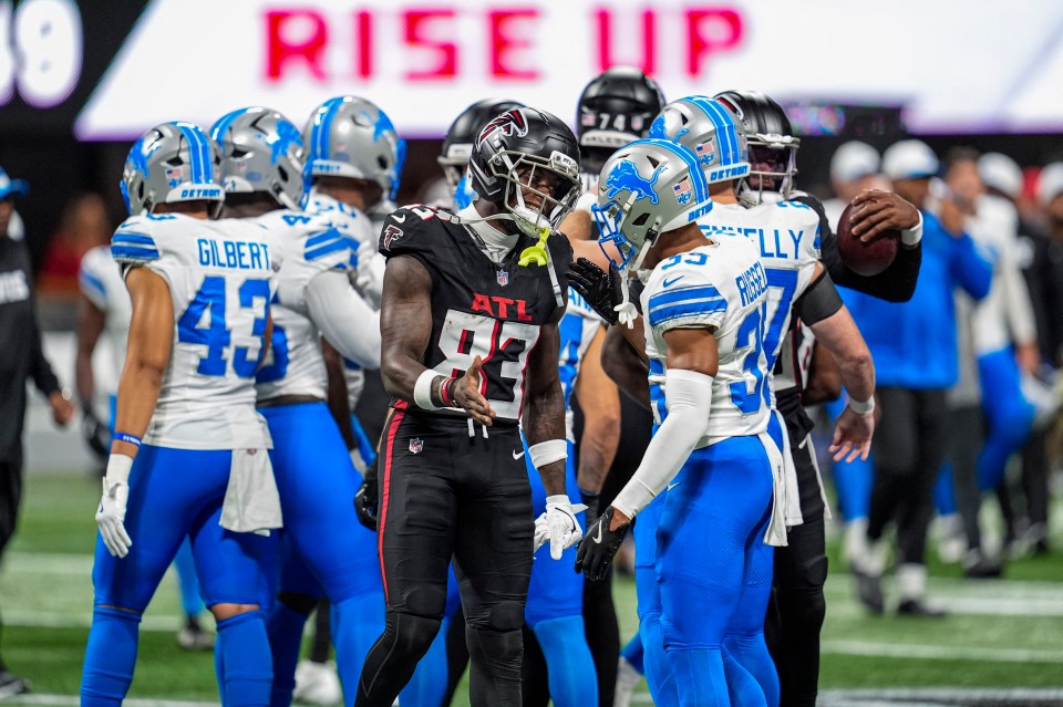Detroit Lions and Atlanta Falcons players on the field.