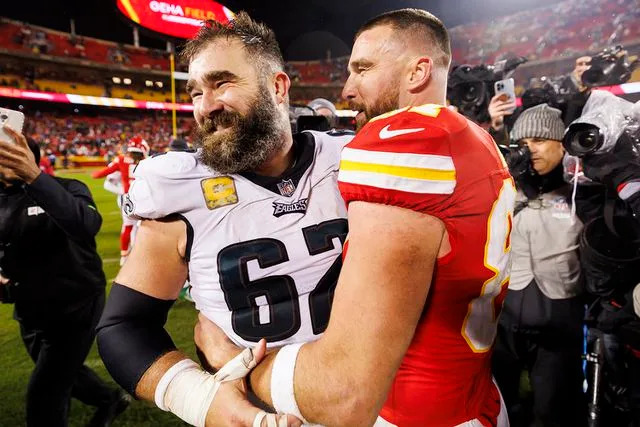 Ryan Kang/Getty Travis Kelce and his brother, Jason Kelce, embrace after a game in November 2023