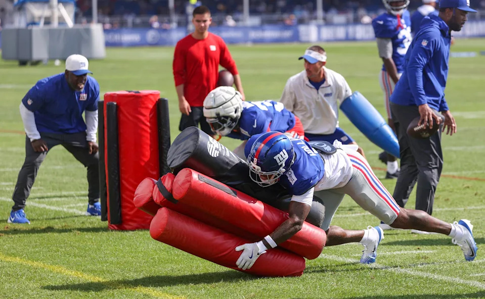 New York Giants safety Jevon Holland (8) participates in drills during a joint training camp practice with the New York Jets, Wednesday, August 13, 2025, in East Rutherford, N.J.