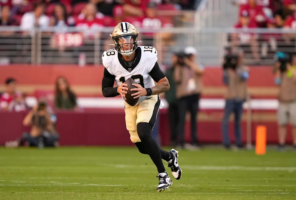 SANTA CLARA, CALIFORNIA - AUGUST 18: Spencer Rattler #18 of the New Orleans Saints scrambles with the ball against the San Francisco 49ers during the first half of a preseason game at Levi's Stadium on August 18, 2024 in Santa Clara, California. (Photo by Thearon W. Henderson/Getty Images)Thearon W. Henderson/Getty Images