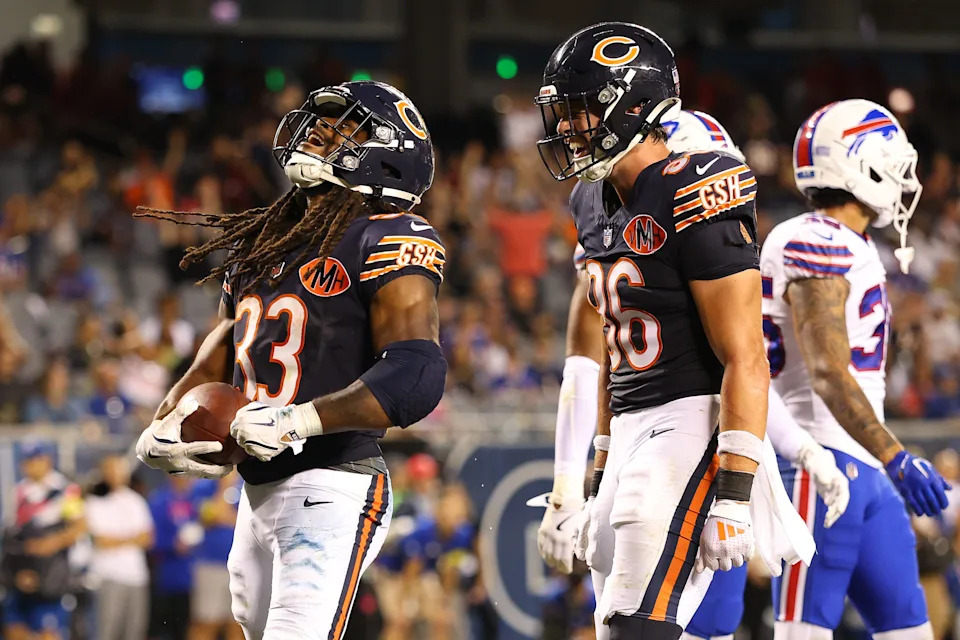 CHICAGO, ILLINOIS - AUGUST 17: Ian Wheeler #33 of the Chicago Bears celebrates with Joel Wilson #86 after a rushing touchdown against the Buffalo Bills during the NFL Preseason 2025 game between Buffalo Bills and Chicago Bears at Soldier Field on August 17, 2025 in Chicago, Illinois. (Photo by Michael Reaves/Getty Images)