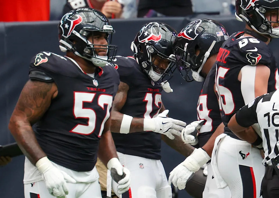 Aug 16, 2025; Houston, Texas, USA; Houston Texans wide receiver Nico Collins (12) celebrates his touchdown against the Carolina Panthers in the first quarter at NRG Stadium. Mandatory Credit: Thomas Shea-Imagn Images