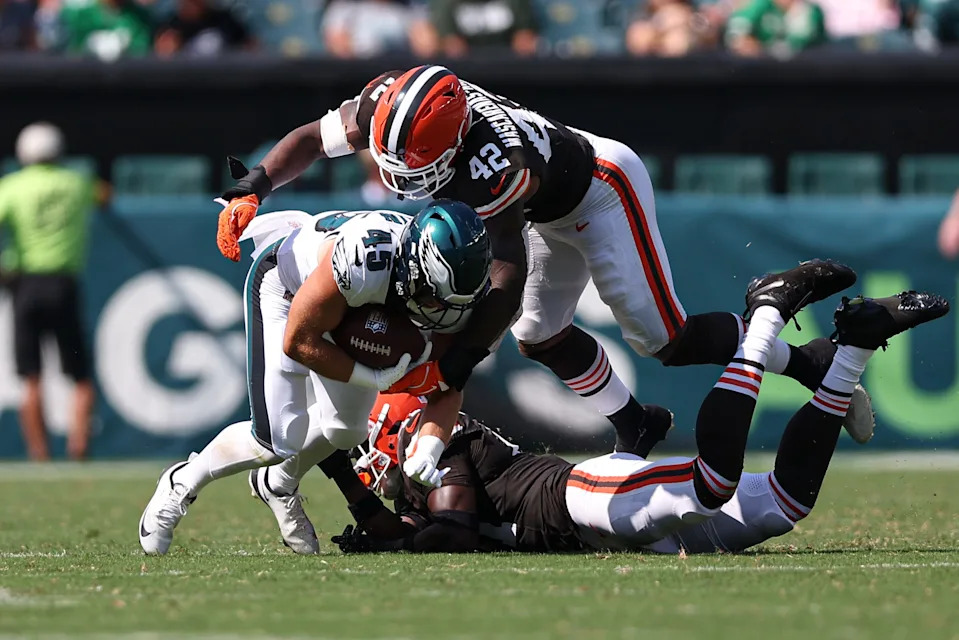 Aug 16, 2025; Philadelphia, Pennsylvania, USA; Philadelphia Eagles wide receiver Taylor Morin (45) is tackled by Cleveland Browns linebacker Easton Mascarenas-Arnold (42) during the fourth quarter at Lincoln Financial Field. Mandatory Credit: Bill Streicher-Imagn Images