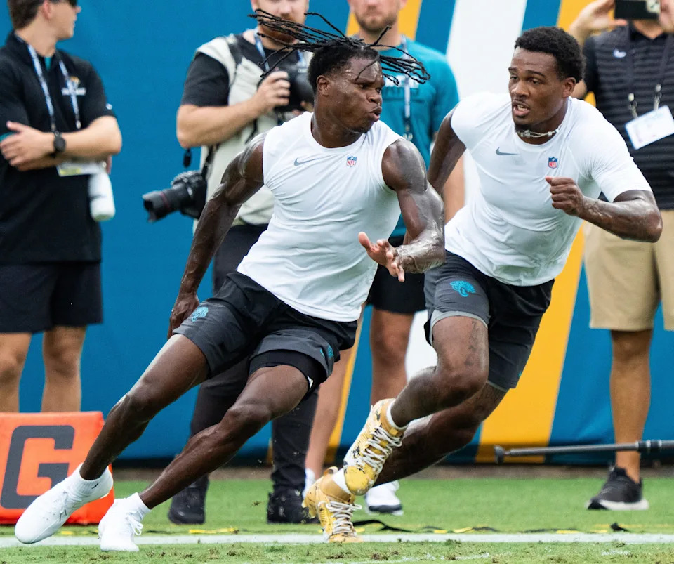 Jacksonville Jaguars wide receiver Travis Hunter (12) and Jacksonville Jaguars cornerback Jarrian Jones (22) works a drill before the first preseason game where the Jacksonville Jaguars hosted the Pittsburgh Steelers Saturday Aug. 9, 2025, at EverBank Stadium in Jacksonville, Fla. [Doug Engle/Florida Times-Union]
