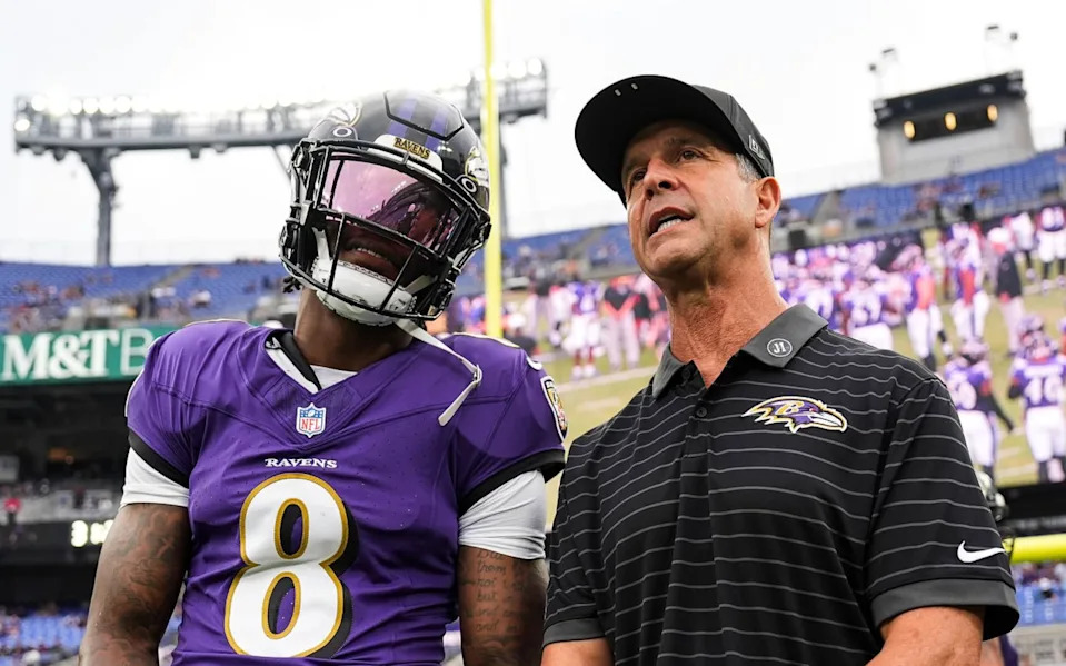 BALTIMORE, MD - AUGUST 07: Lamar Jackson #8 of the Baltimore Ravens talks with head coach John Harbaugh prior to an NFL preseason football game against the Indianapolis Colts at M&T Bank Stadium in Baltimore, Maryland. (Photo by Perry Knotts/Getty Images)