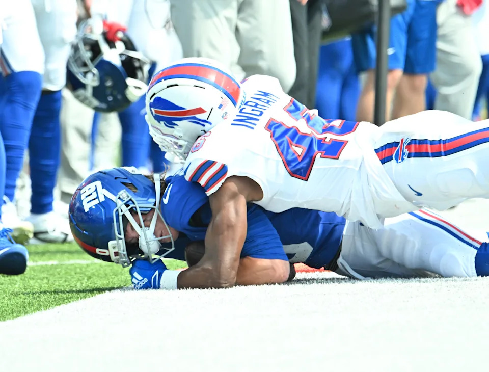 Aug 9, 2025; Orchard Park, New York, USA; New York Giants wide receiver Gunner Olszewski (0) is tackled by Buffalo Bills cornerback Ja'Marcus Ingram (46) in the third quarter at Highmark Stadium. Mandatory Credit: Mark Konezny-Imagn Images