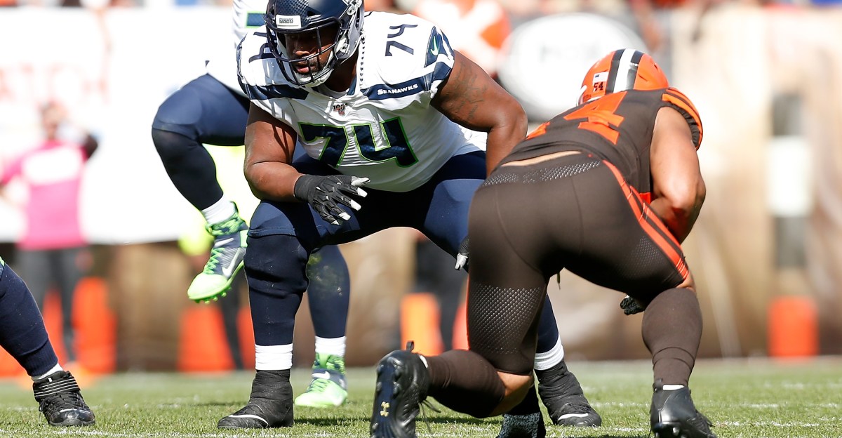 Washington Commanders sign former Seattle Seahawks tackle George Fant