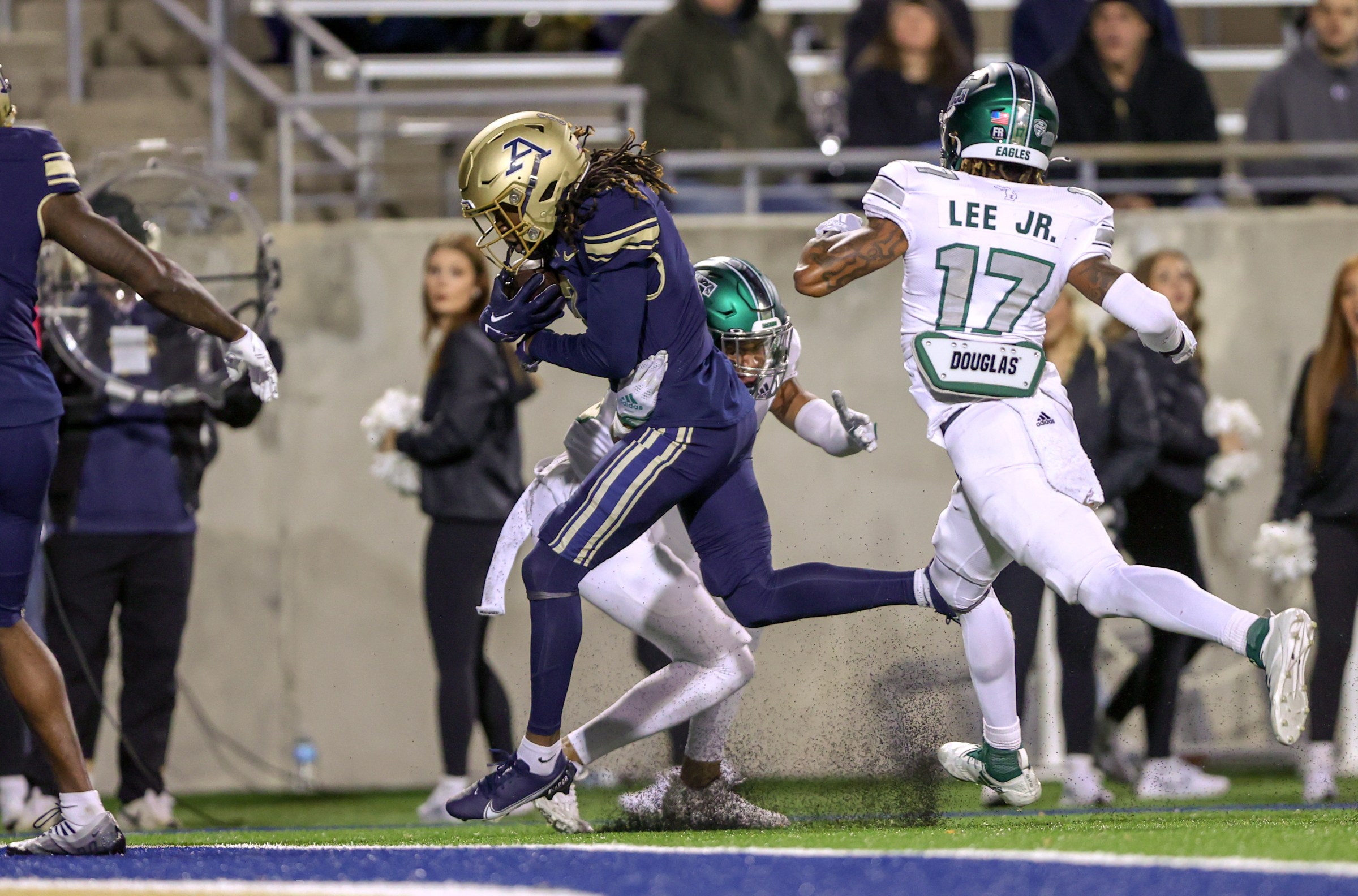 AKRON, OH - NOVEMBER 08: Akron Zips wide receiver Alex Adams (7) scores on a 10-yard touchdown pass during the first quarter of the college football game between the Eastern Michigan Eagles and Akron Zips on November 8, 2022, at Summa Field at InfoCision Stadium in Akron, OH. (Photo by Frank Jansky/Icon Sportswire via Getty Images)