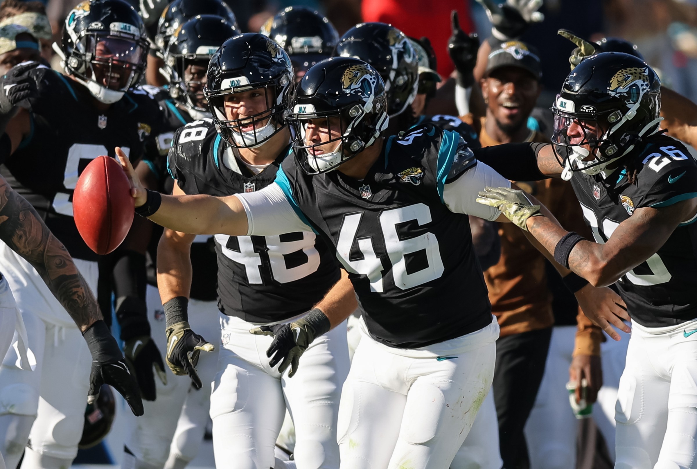 JACKSONVILLE, FLORIDA - NOVEMBER 19: Ross Matiscik #46 of the Jacksonville Jaguars celebrates his fumble recovery against the Tennessee Titans during the game at EverBank Field on November 19, 2023 in Jacksonville, Florida. (Photo by Mike Carlson/Getty Images)