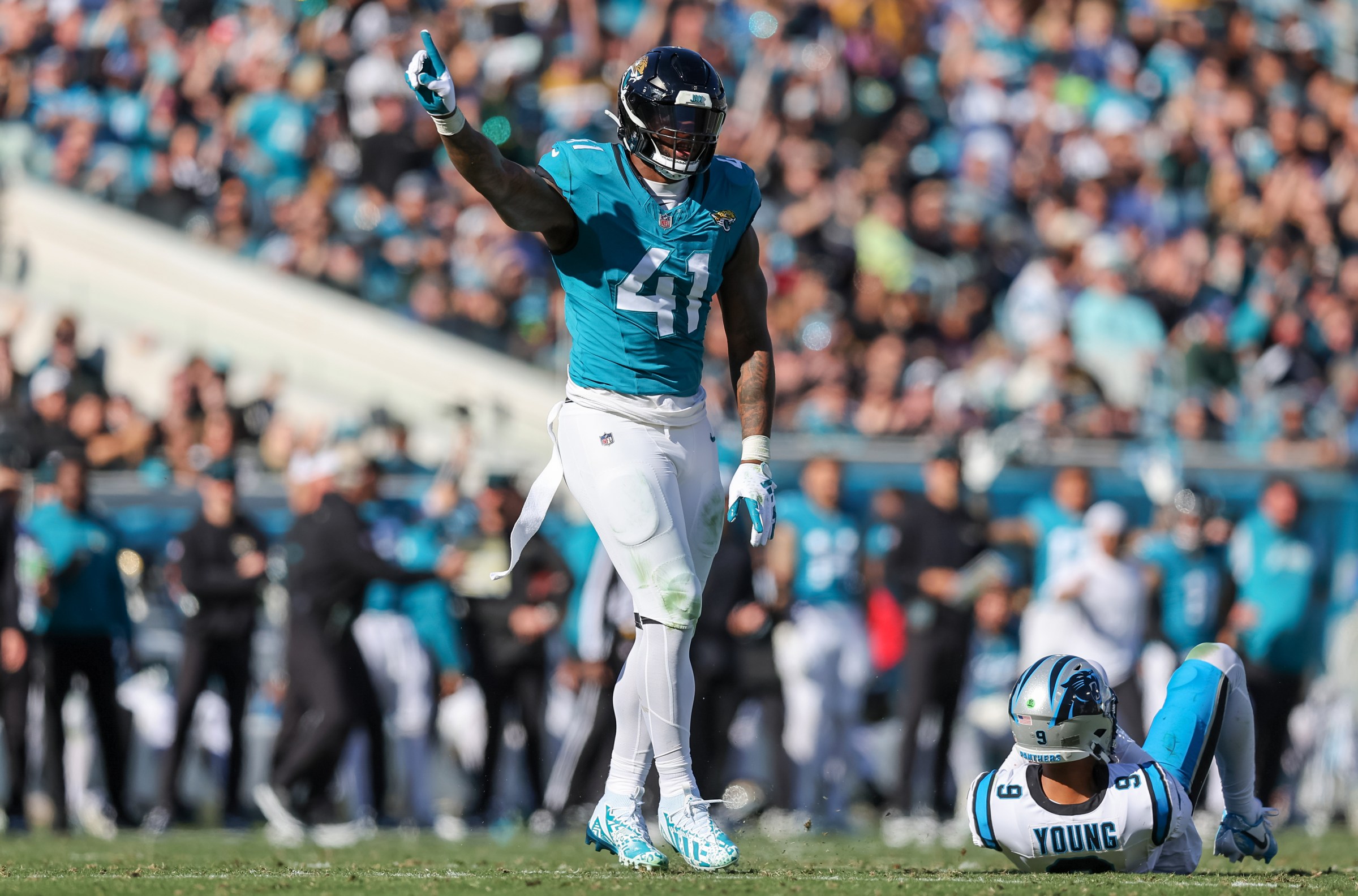 JACKSONVILLE, FLORIDA - DECEMBER 31: Josh Allen #41 of the Jacksonville Jaguars celebrates his sack of Bryce Young #9 of the Carolina Panthers during the first half of the game at EverBank Stadium on December 31, 2023 in Jacksonville, Florida. (Photo by Mike Carlson/Getty Images)