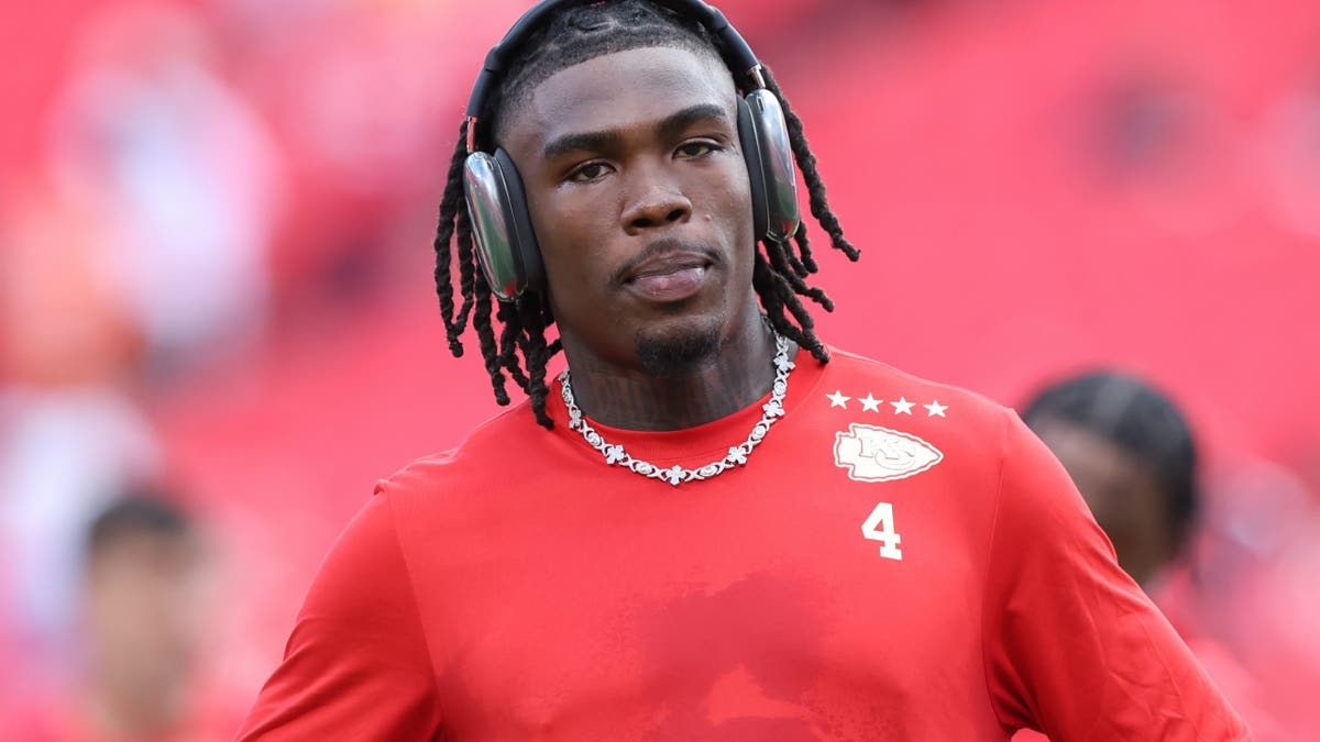 Rashee Rice warms up on field