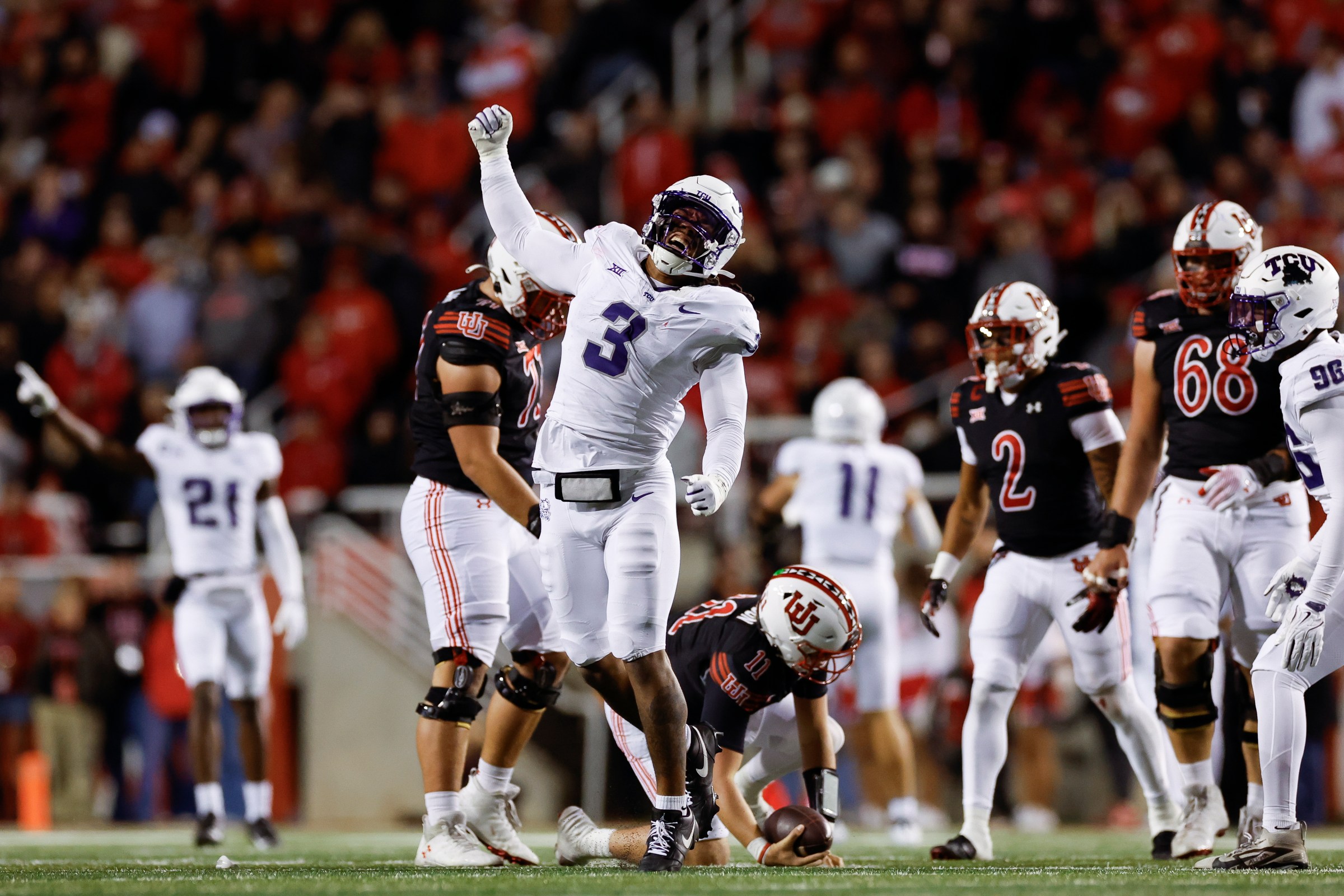 SALT LAKE CITY, UT - OCTOBER 19: Kaleb Elarms-Orr #3 of the TCU Horned Frogs celebrates after a sack in the first half against the Utah Utes at Rice Eccles Stadium on October 19, 2024 in Salt Lake City, Utah. (Photo by Aaron M. Sprecher/Getty Images