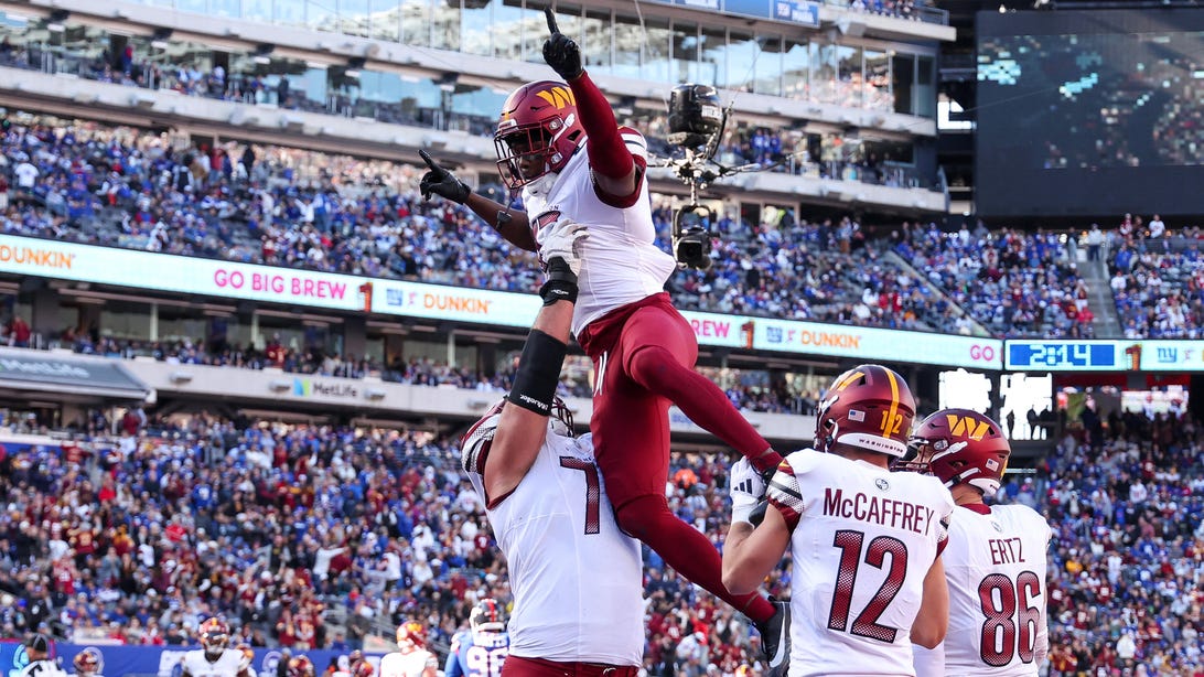 EAST RUTHERFORD, NEW JERSEY - NOVEMBER 03: Terry McLaurin #17 of the Washington Commanders celebrates a touchdown with teammates during the second quarter against the New York Giants at MetLife Stadium on November 03, 2024 in East Rutherford, New Jersey.
