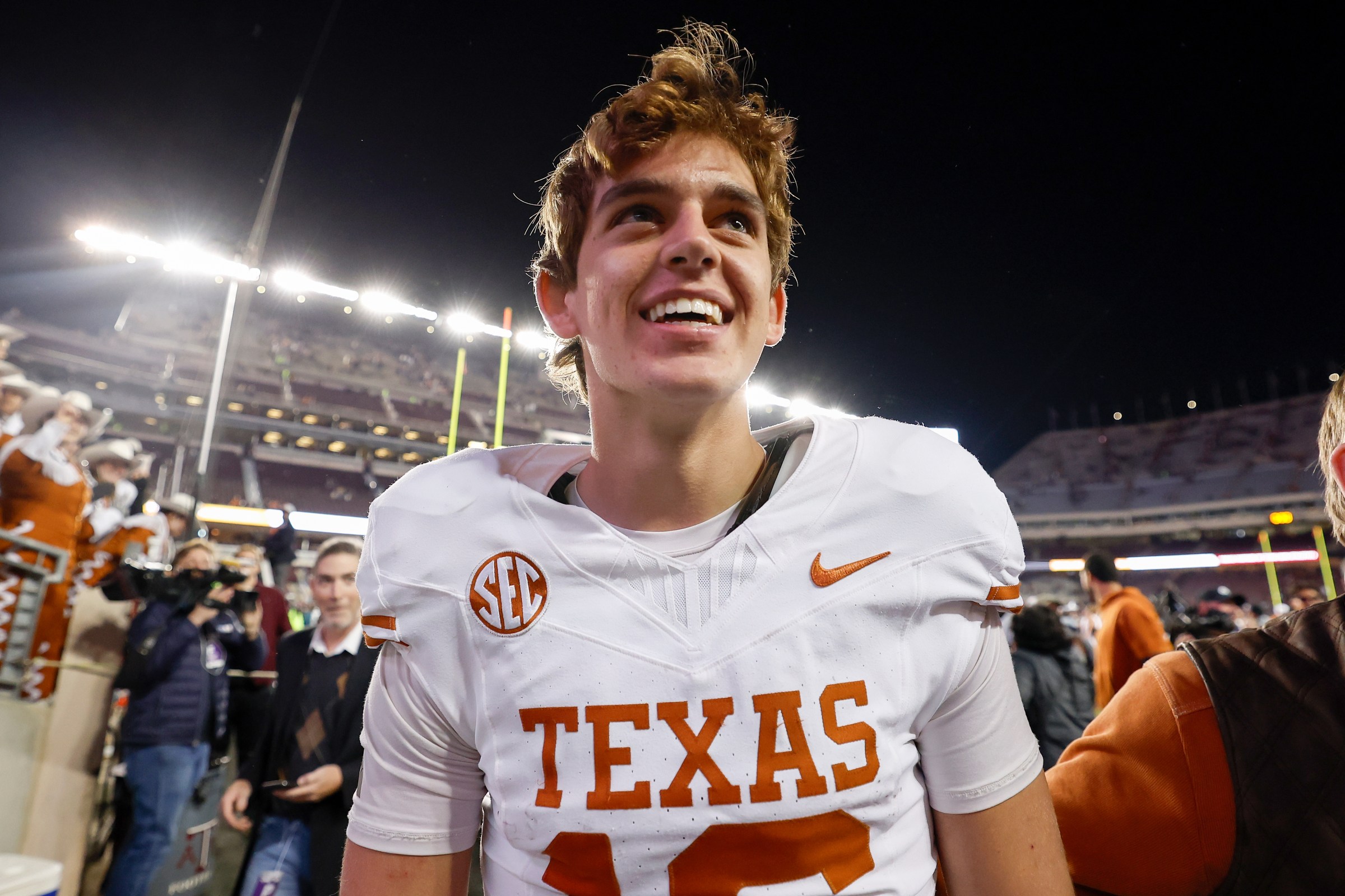 COLLEGE STATION, TEXAS - NOVEMBER 30: Arch Manning #16 of the Texas Longhorns celebrates after the game against the Texas A&M Aggies at Kyle Field on November 30, 2024 in College Station, Texas. (Photo by Tim Warner/Getty Images)