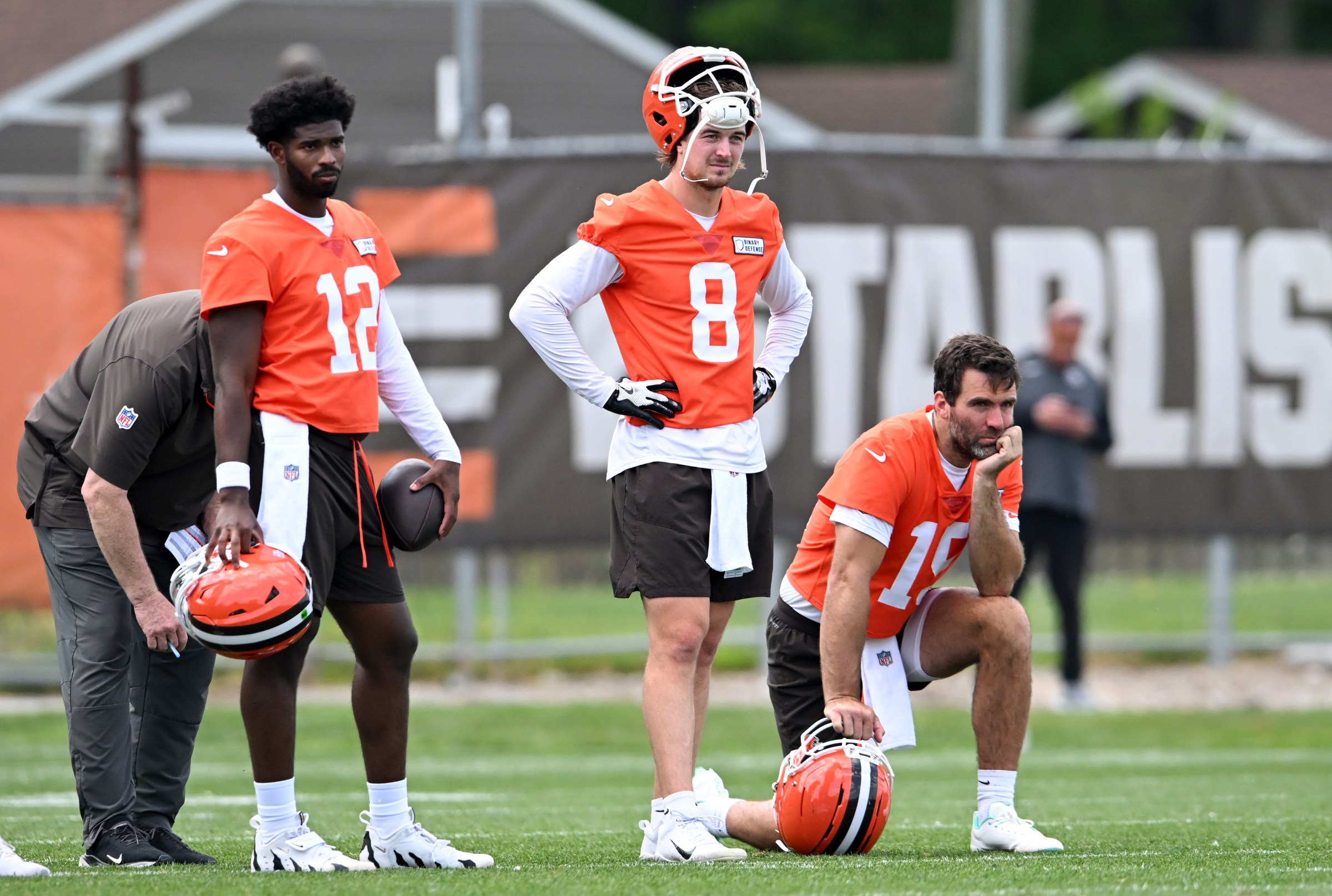 BEREA, OHIO - JUNE 04: (L-R) Shedeur Sanders #12, Kenny Pickett #8 and Joe Flacco #15 of the Cleveland Browns watch a drill during Cleveland Browns OTA offseason workouts at CrossCountry Mortgage Campus on June 04, 2025 in Berea, Ohio. (Photo by Nick Cammett/Getty Images)