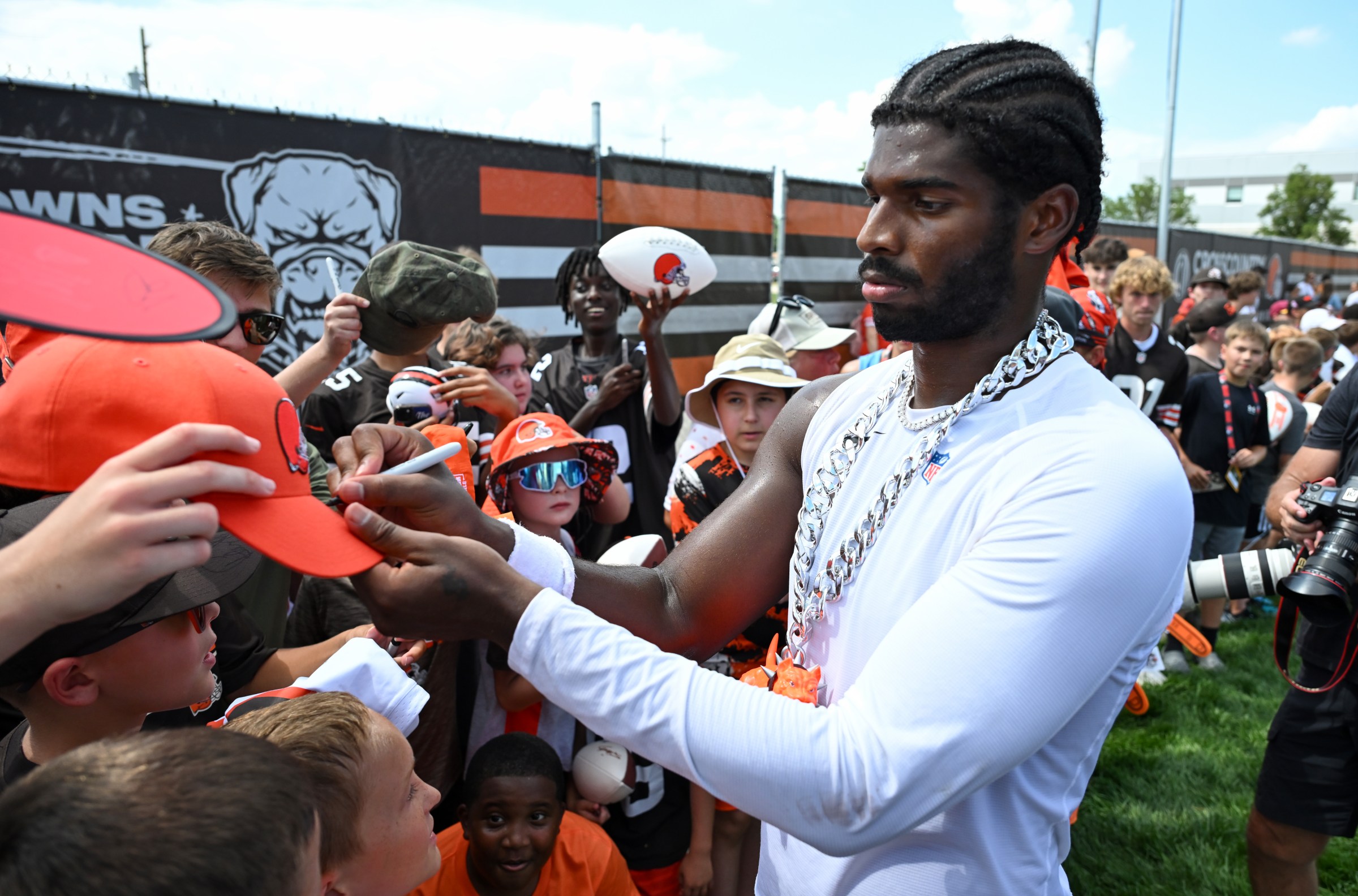 BEREA, OHIO - JULY 28: Shedeur Sanders #12 of the Cleveland Browns signs autographs after Cleveland Browns training camp at CrossCountry Mortgage Campus on July 28, 2025 in Berea, Ohio. (Photo by Nick Cammett/Getty Images)