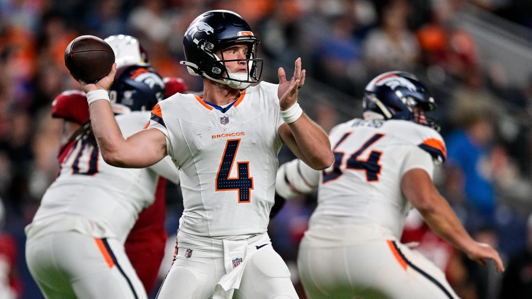DENVER, CO - AUGUST 16: Denver Broncos quarterback Sam Ehlinger (4) sets to pass in the third quarter during a preseason game between the Arizona Cardinals and the Denver Broncos at Empower Field at Mile High on August 16, 2025 in Denver, Colorado.
