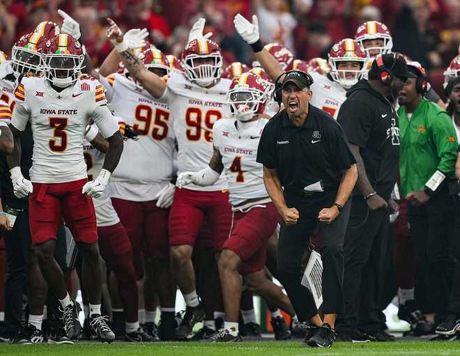 Dublin , Ireland - 23 August 2025; Iowa State Cyclones head coach Matt Campbell and players celebrate a turnover during the first quarter of the 2025 Aer Lingus College Football Classic match between Kansas State University and Iowa State University at the Aviva Stadium in Dublin. (Photo By Brendan Moran/Sportsfile via Getty Images)