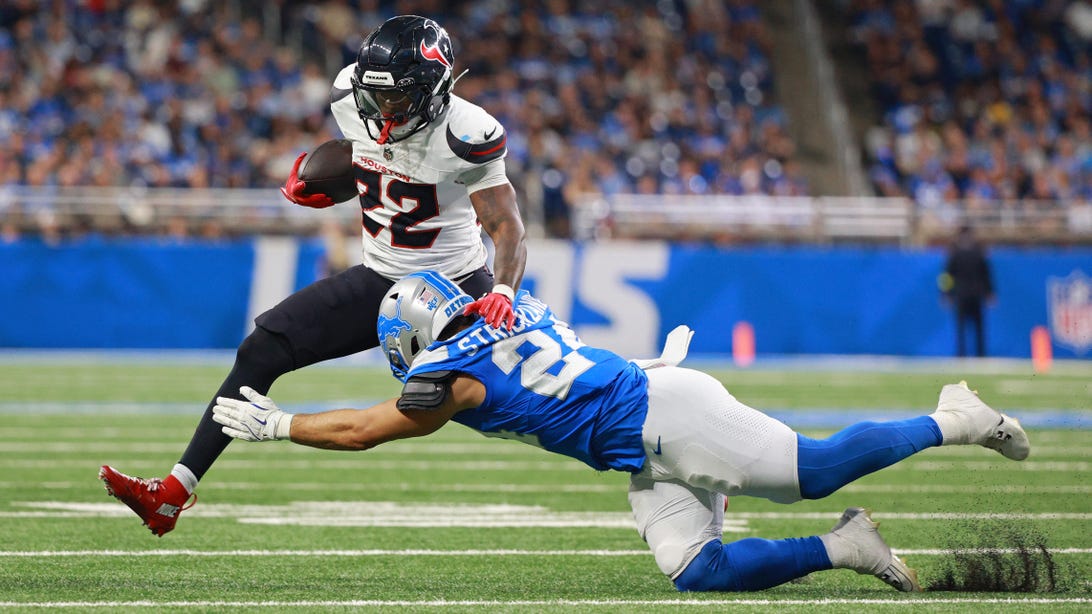 DETROIT,MICHIGAN-AUGUST 23: Houston Texans running back Jawhar Jordan #22 runs the ball against Detroit Lions safety Loren Strickland #24 during the second half of an NFL football game between the Houston Texans and the Detroit Lions in Detroit, Michigan USA, on Saturday, August 23, 2025