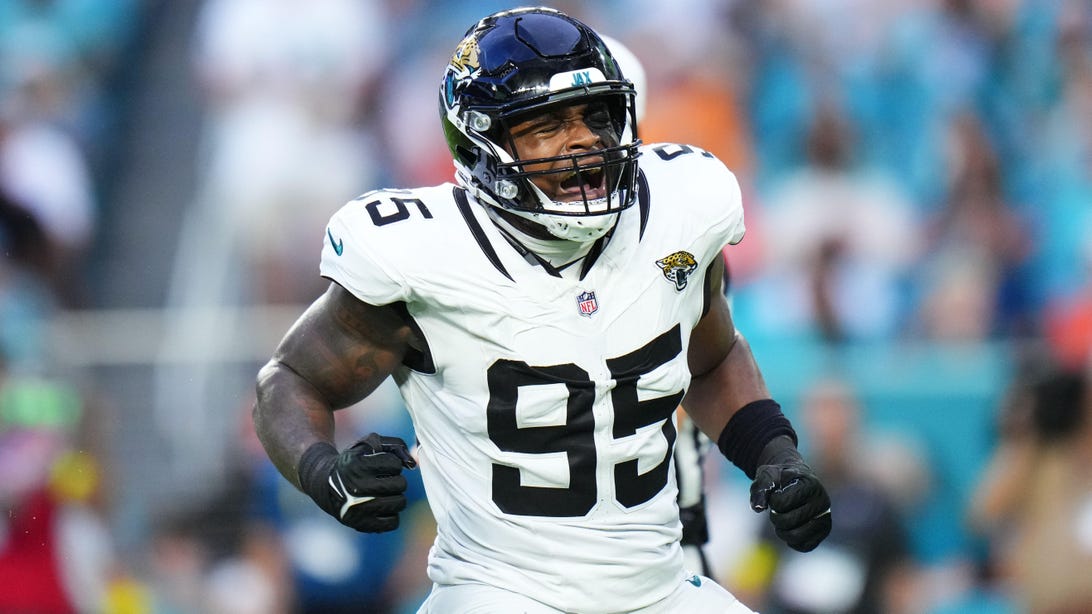 MIAMI GARDENS, FLORIDA - AUGUST 23: BJ Green II #95 of the Jacksonville Jaguars reacts after making a sack against the Miami Dolphins during the first quarter of the NFL Preseason 2025 game between Jacksonville Jaguars and Miami Dolphins at Hard Rock Stadium on August 23, 2025 in Miami Gardens, Florida.