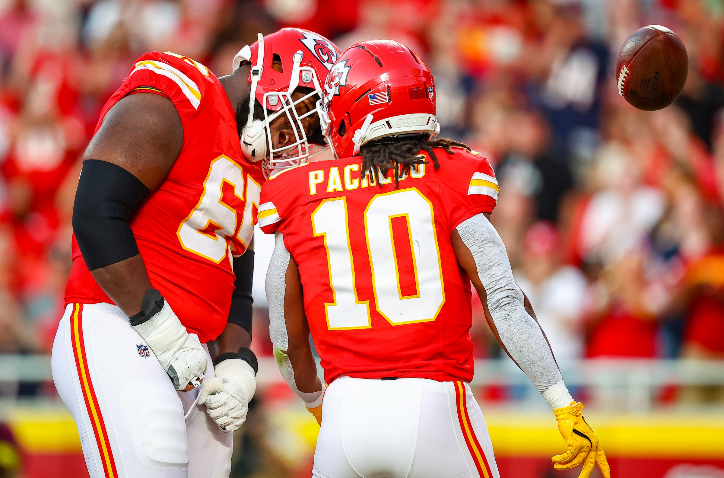 KANSAS CITY, MISSOURI - AUGUST 22: Trey Smith #65 of the Kansas City Chiefs celebrates the touchdown run of Isiah Pacheco #10 of the Kansas City Chiefs in the first quarter during the NFL Preseason 2025 game between Chicago Bears and Kansas City Chiefs at Arrowhead Stadium on August 22, 2025 in Kansas City, Missouri. (Photo by David Eulitt/Getty Images)