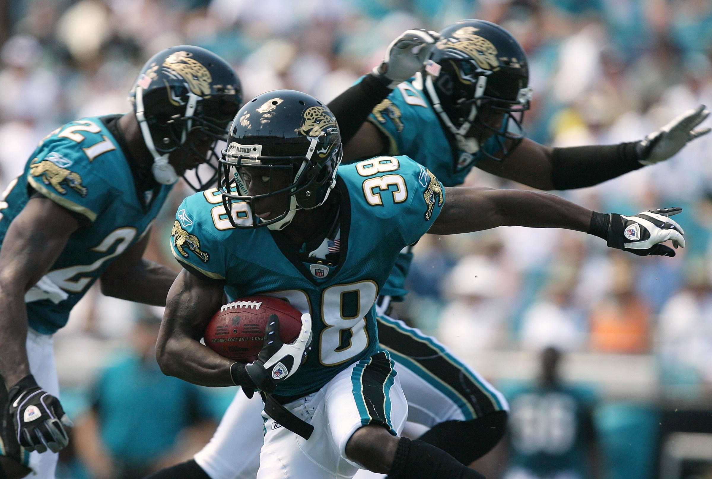 JACKSONVILLE, FL - SEPTEMBER 14: Punt returner Brian Witherspoon #38 of the Jacksonville Jaguars looks for room to run while taking on the Buffalo Bills at Jacksonville Municipal Stadium on September 14, 2008 in Jacksonville, Florida. (Photo by Doug Benc/Getty Images)