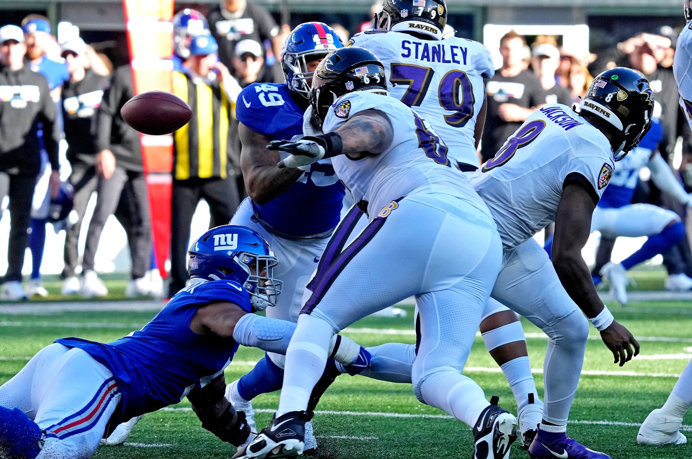 Lamar Jackson (8) fumbles the ball against the New York Giants during the second half at MetLife Stadium in a 2022 game.