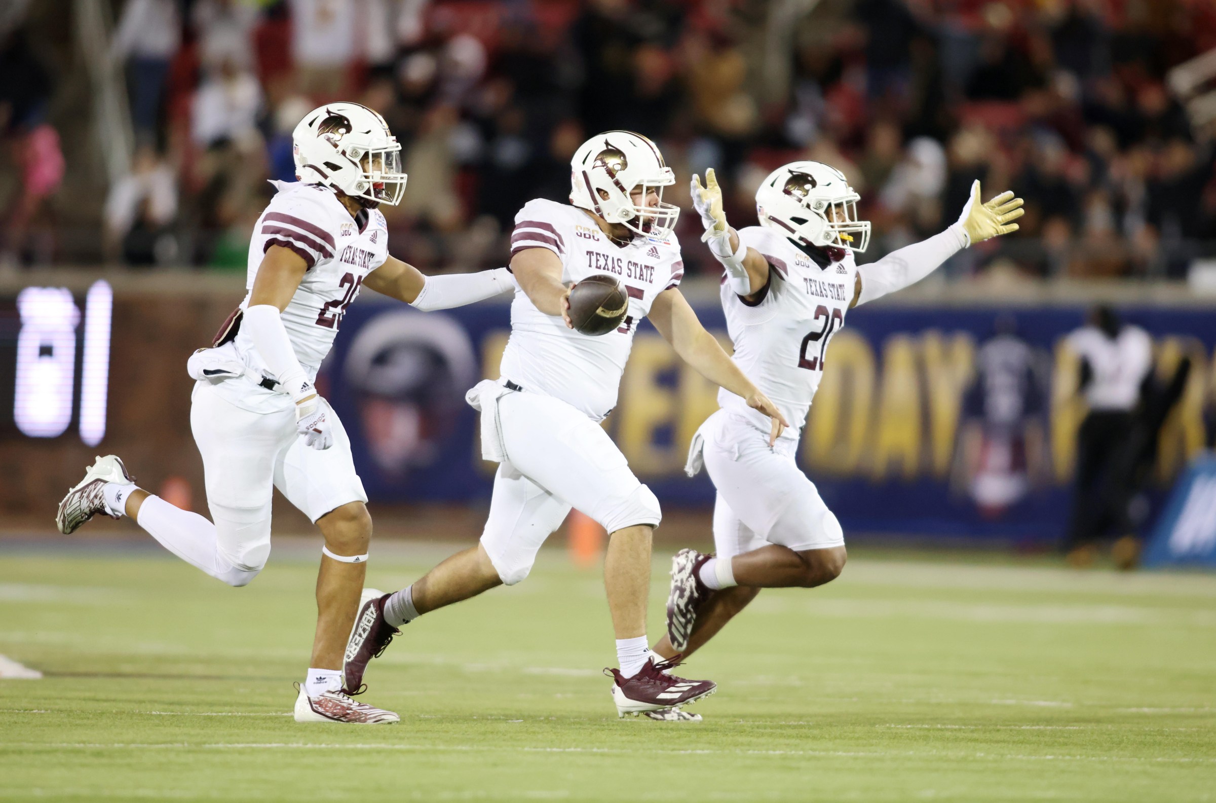 Dec 26, 2023; Dallas, TX, USA; Texas State Bobcats cornerback Rodrick Hockley (15) and his teammates react after he recovered a muffed punt in the fourth quarter against the Rice Owls at Gerald J Ford Stadium. Mandatory Credit: Tim Heitman-Imagn Images