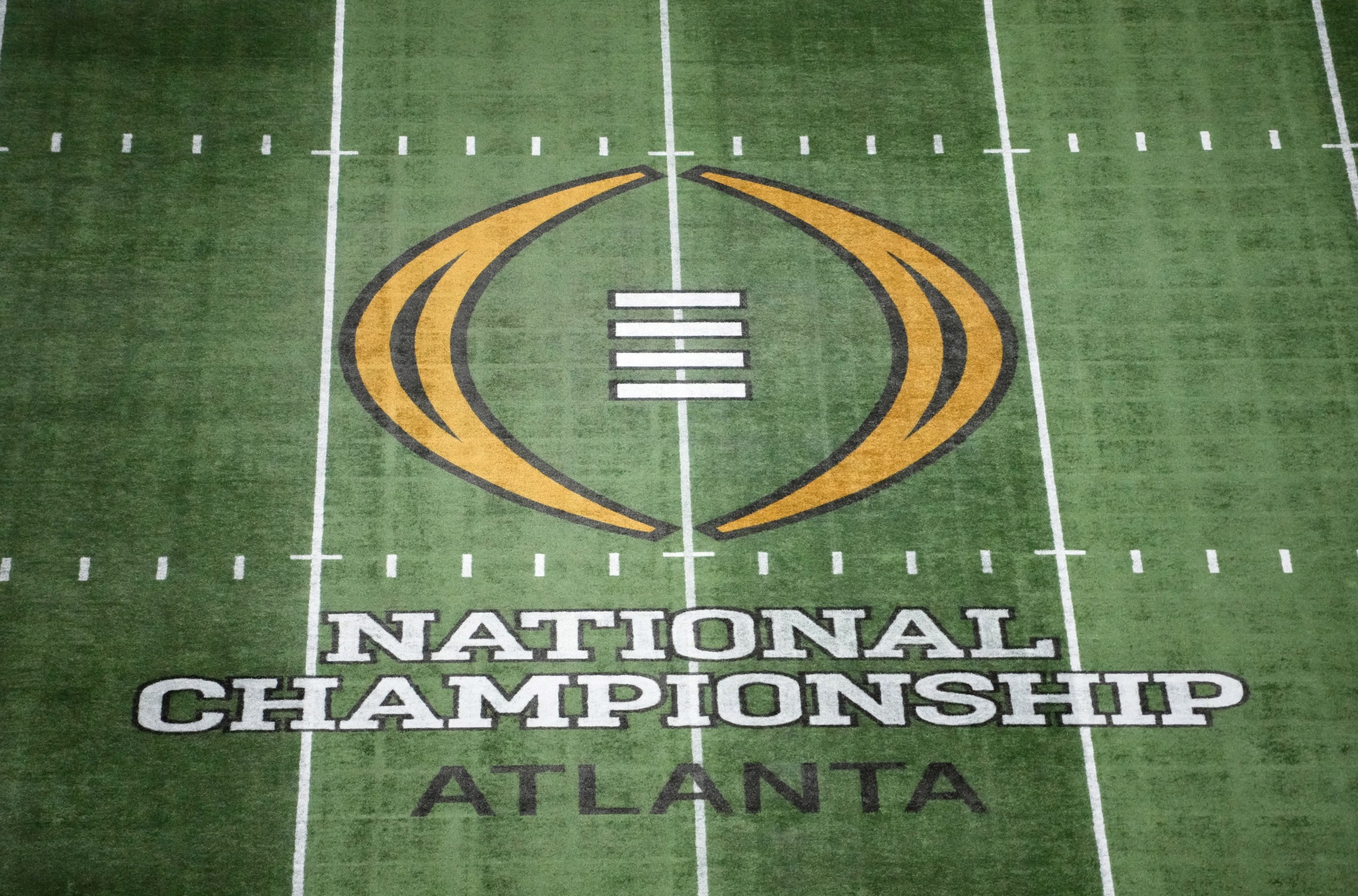 Jan 19, 2025; Atlanta, GA, USA; The College Football Playoff National Championship logo at midfield at Mercedes-Benz Stadium, the site of the 2025 College Football Playoff National Championship between the Ohio State Buckeyes and the Notre Dame Fighting Irish. Mandatory Credit: Kirby Lee-Imagn Images