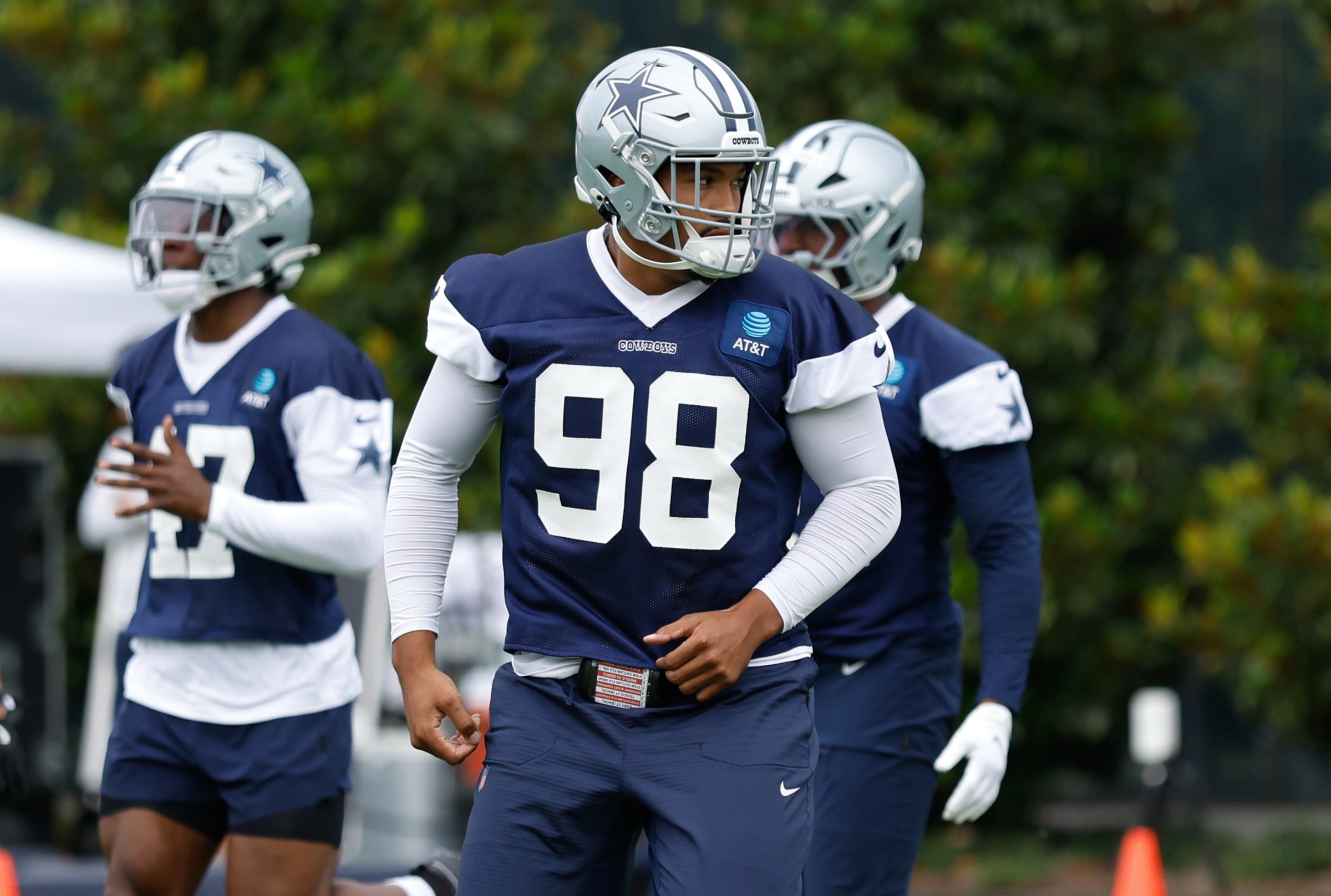 Jun 10, 2025; Arlington, TX, USA; Dallas Cowboys defensive end Payton Turner (98) goes through a drill during practice at the Ford Center at the Star Training Facility in Frisco, Texas. Mandatory Credit: Chris Jones-Imagn Images
