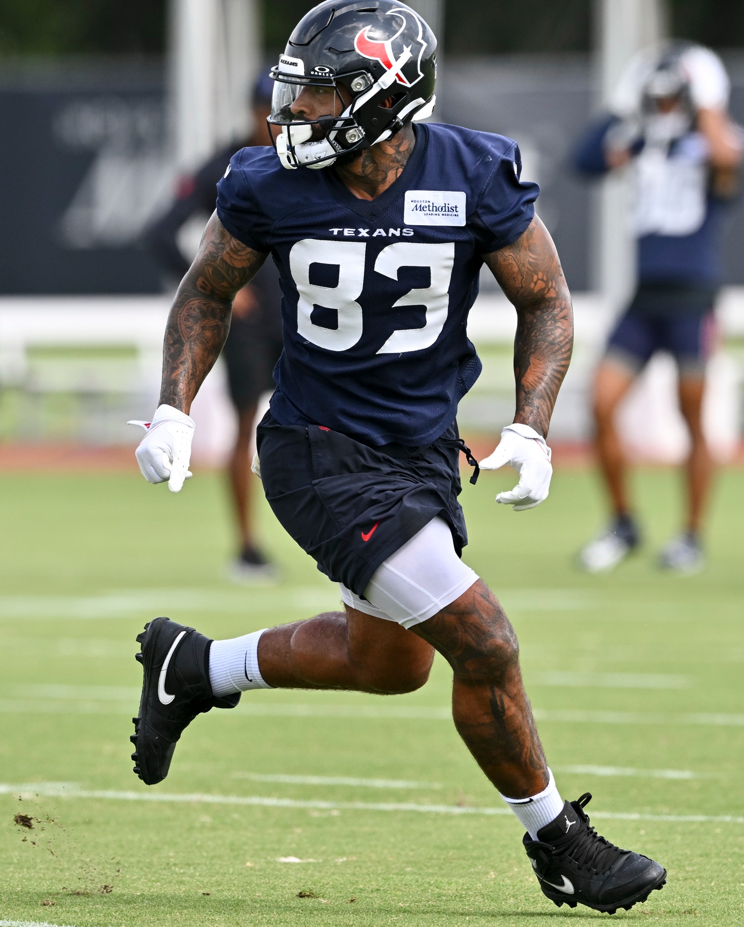 Jun 10, 2025; Houston, TX, USA; Houston Texans tight end Irv Smith Jr. (83) participates in a drill during an NFL football minicamp at NRG Stadium. Mandatory Credit: Maria Lysaker-Imagn Images