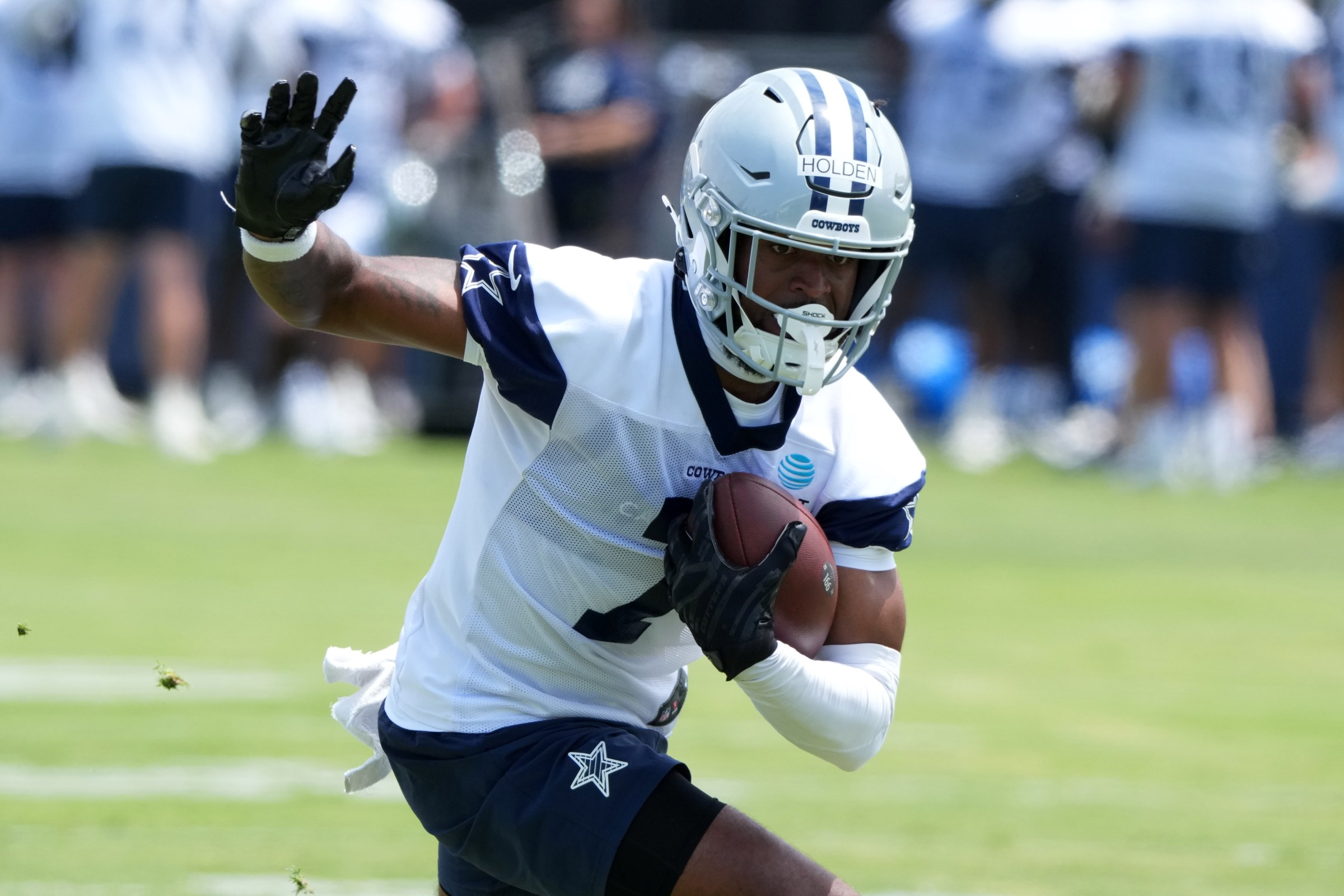 Jul 22, 2025; Oxnard, CA, USA; Dallas Cowboys receiver Traeshon Holden carries the ball during training camp at the River Ridge Fields. Mandatory Credit: Kirby Lee-Imagn Images