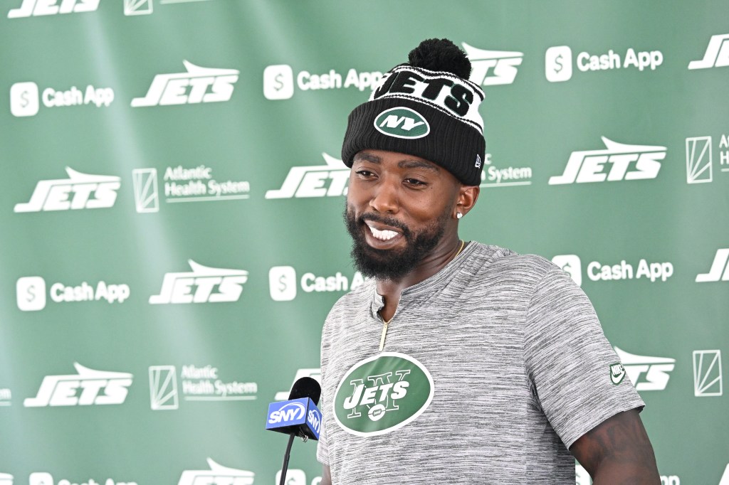 Tyrod Taylor, New York Jets quarterback, speaks to the media.