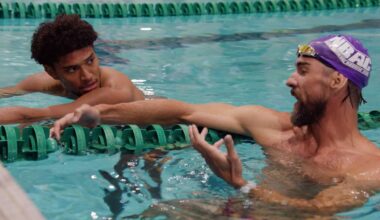 Michael Phelps Teaches Ravens to Swim, Visits Practice