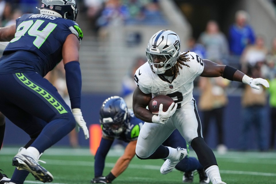 Las Vegas Raiders running back Ashton Jeanty running with the football.