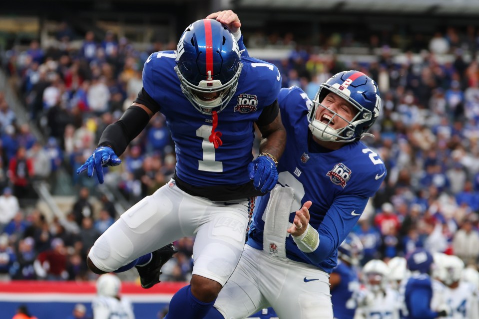 New York Giants players Malik Nabers and Drew Lock celebrating a touchdown.