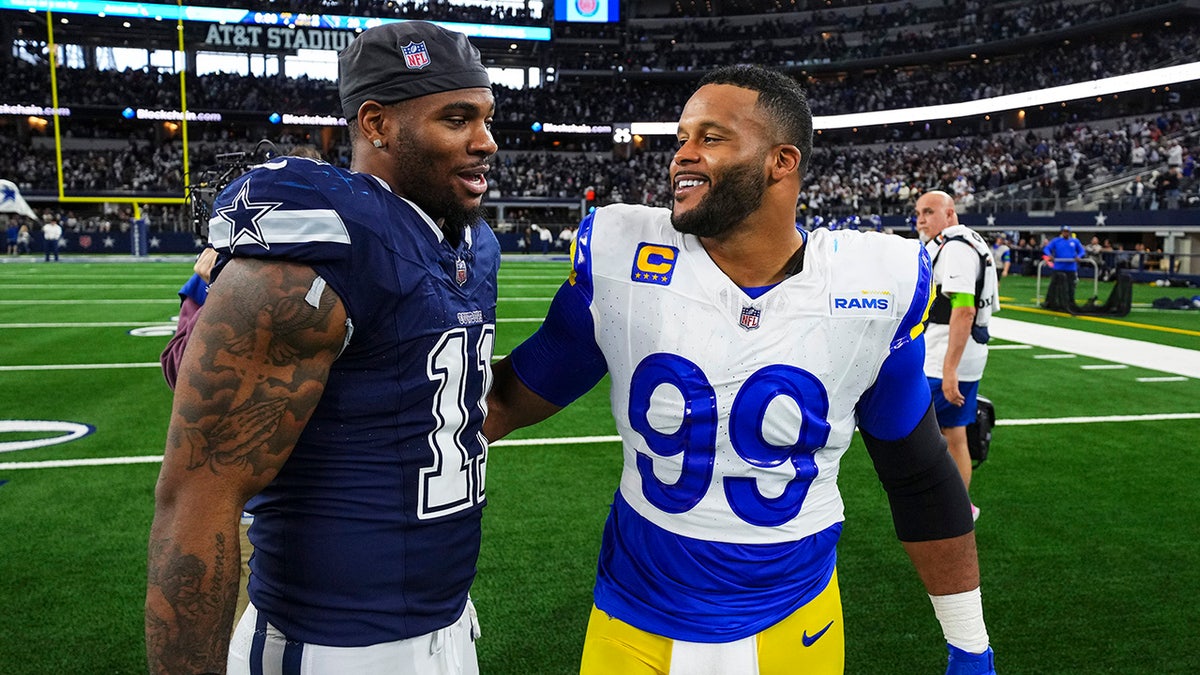 Micah Parsons talks with Aaron Donald