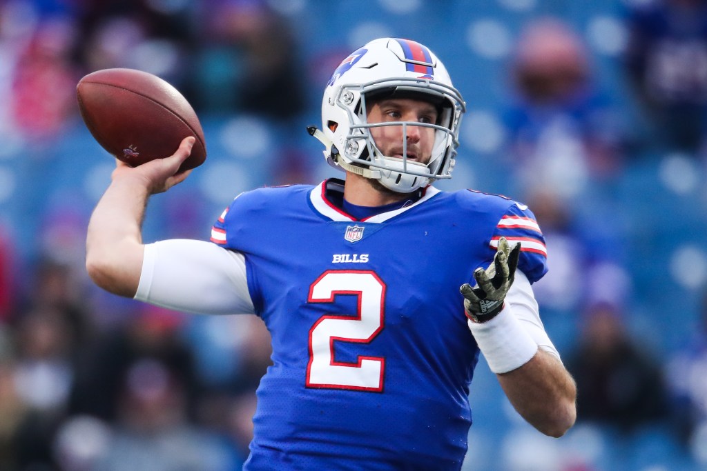Buffalo Bills quarterback Nathan Peterman throwing a football.