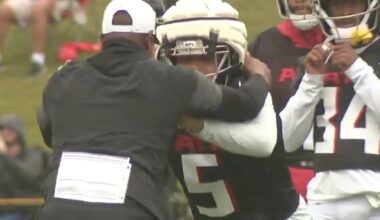 Stunning moment as NFL head coach pushed to ground by his own star player during training camp