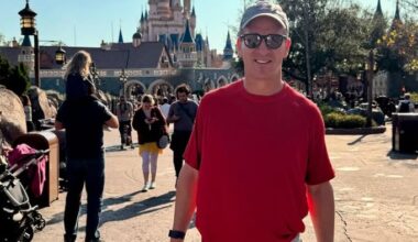 Peyton Manning in red shirt