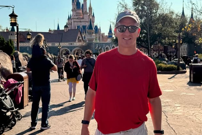 Peyton Manning in red shirt