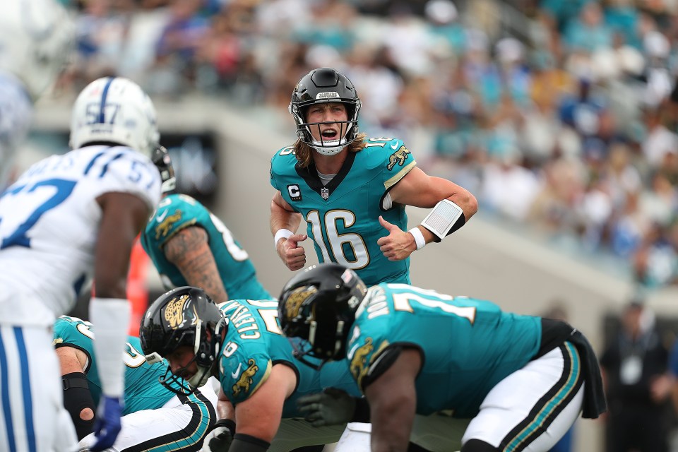 Trevor Lawrence #16 of the Jacksonville Jaguars at the line of scrimmage.