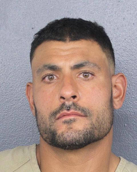 Mugshot of Ryan Crow, NFL coach arrested on domestic battery charge.