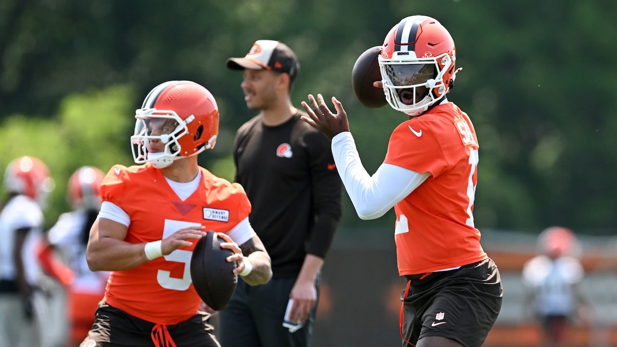 BEREA, OHIO - JUNE 11: Shedeur Sanders #12 and Dillon Gabriel #5 of the Cleveland Browns throw passes during Cleveland Browns mandatory minicamp at CrossCountry Mortgage Campus on June 11, 2025 in Berea, Ohio.